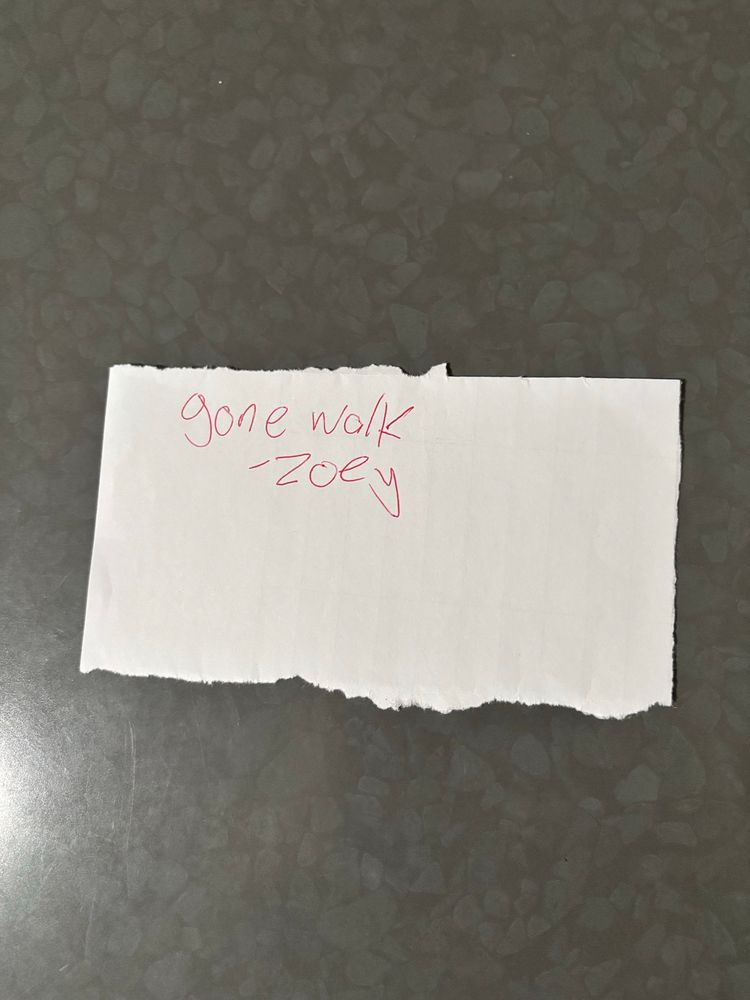 note says  
gone walk 
- zoey