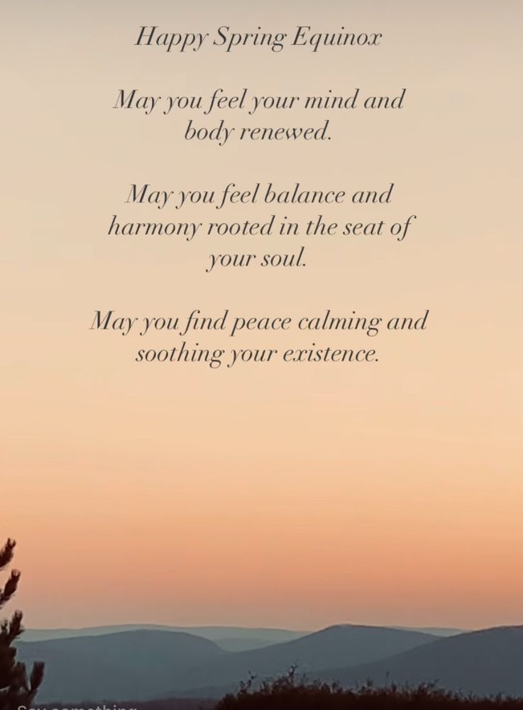 Sunrise with hills in the backdrop and a pine tree up close on the left and a fringe of bushes at the forefront.