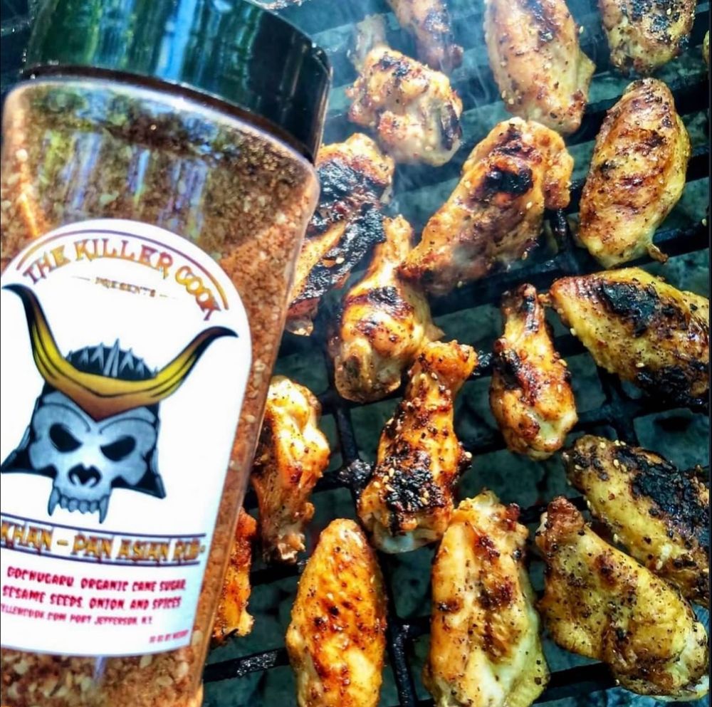 A picture of grilled wings with The Killer Cooks Chow Khan