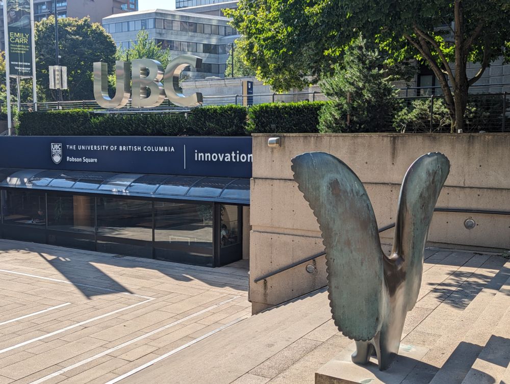 Exterior of the UBC Robson Square building in the sun.