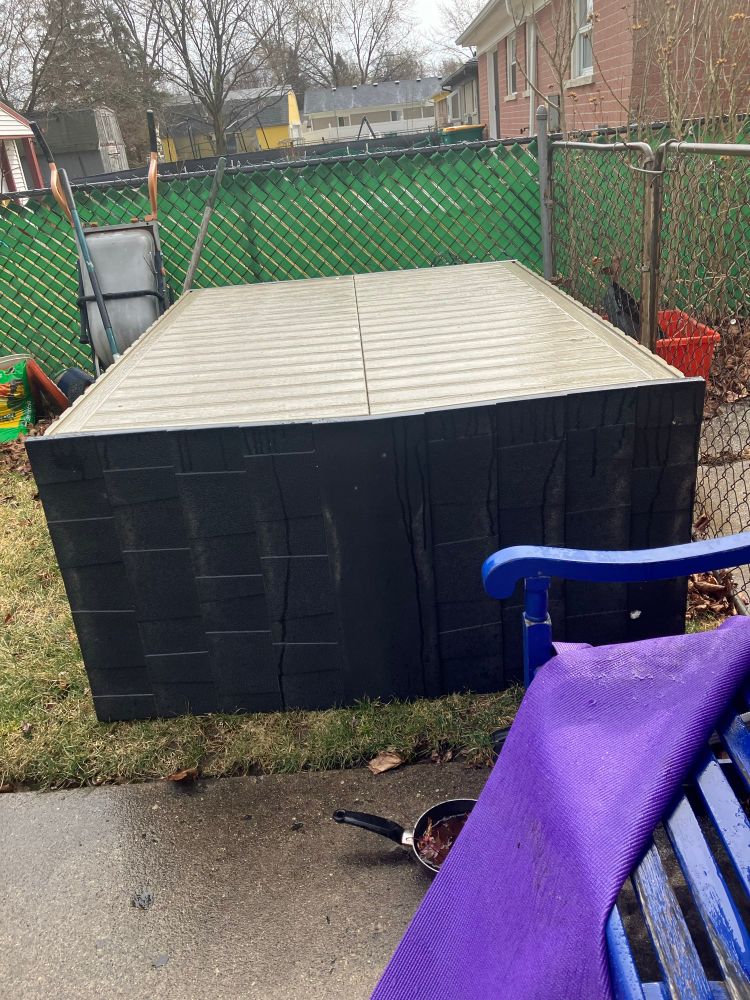 Shed blown over by winds in Michigan. 