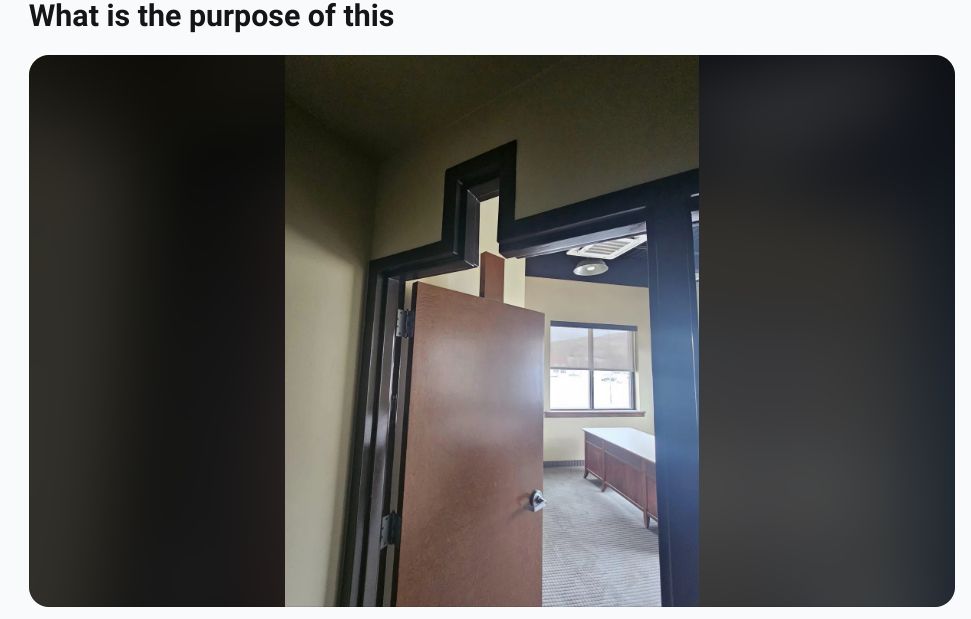 Door with cut out slot in middle top of door frame.