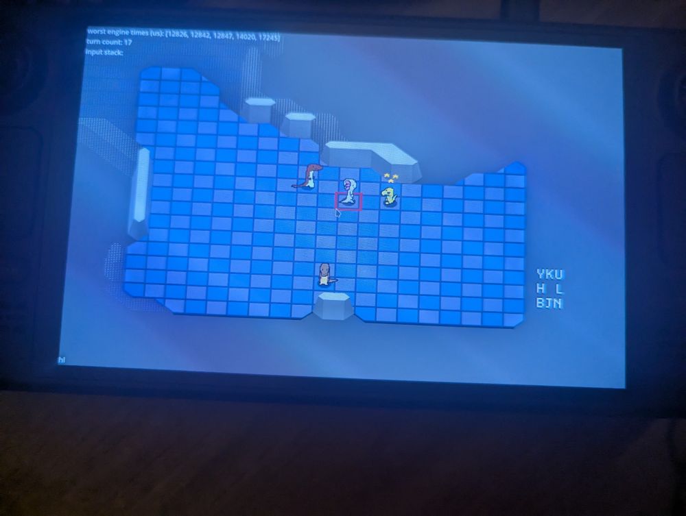 An irl photo of the steam deck. My game is running fullscreen.