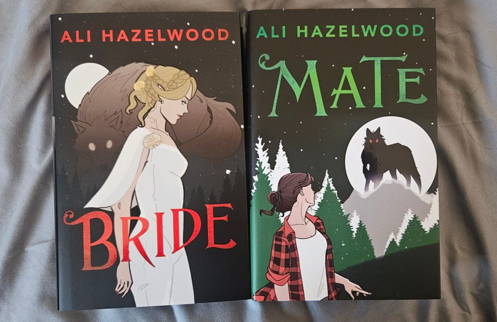 Illumicrate Bride and Mate by Ali Hazelwood side by side on a grey background. Bride has red text, and a blonde woman wearing white standing in front of a wolf and moon. Mate has green text and brunette women facing back looking through a forest at a wolf silhouetted by a full moon
