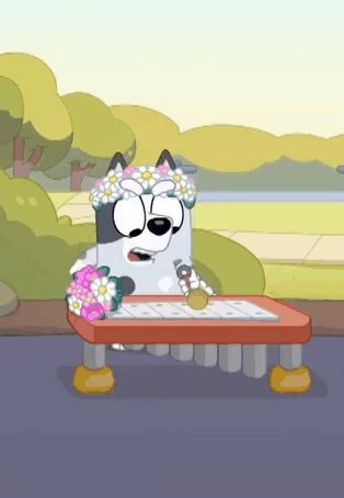 a cartoon dog with a flower crown on his head