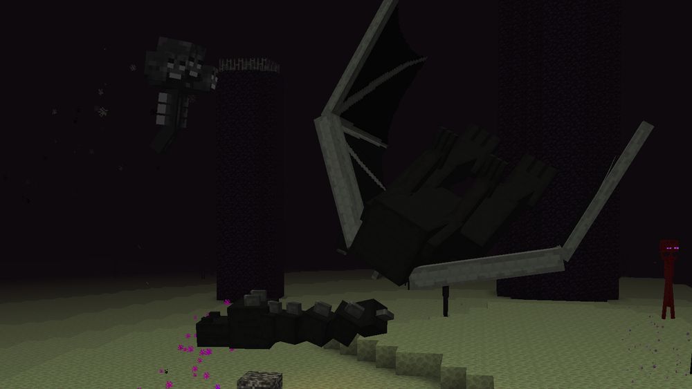 A wither, a decapitated Ender dragon, and an angry enderman taking damage in Minecraft