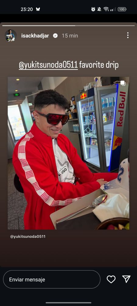 screenshot from isackhadjar on instagram, where he shared yuki tsunoda's post that shows him wearing a red sweatshirt and big sunglasses. he captioned it "@yukitsunoda0511 favorite drip"