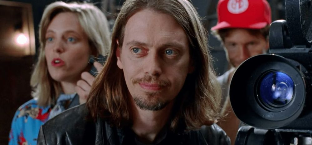 Living in Oblivion. Steve Buscemi as filmmaker Nick Reve. He’s within proximity to a film camera.