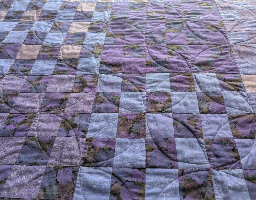 Close up view of quilting and variegation in surface
