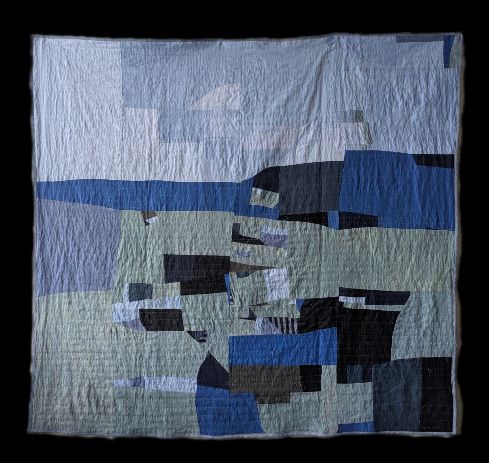 Large abstract landscape quilt made from scrap and repurposed linen fabrics that were dyed, stitched, and hand-quilted. 