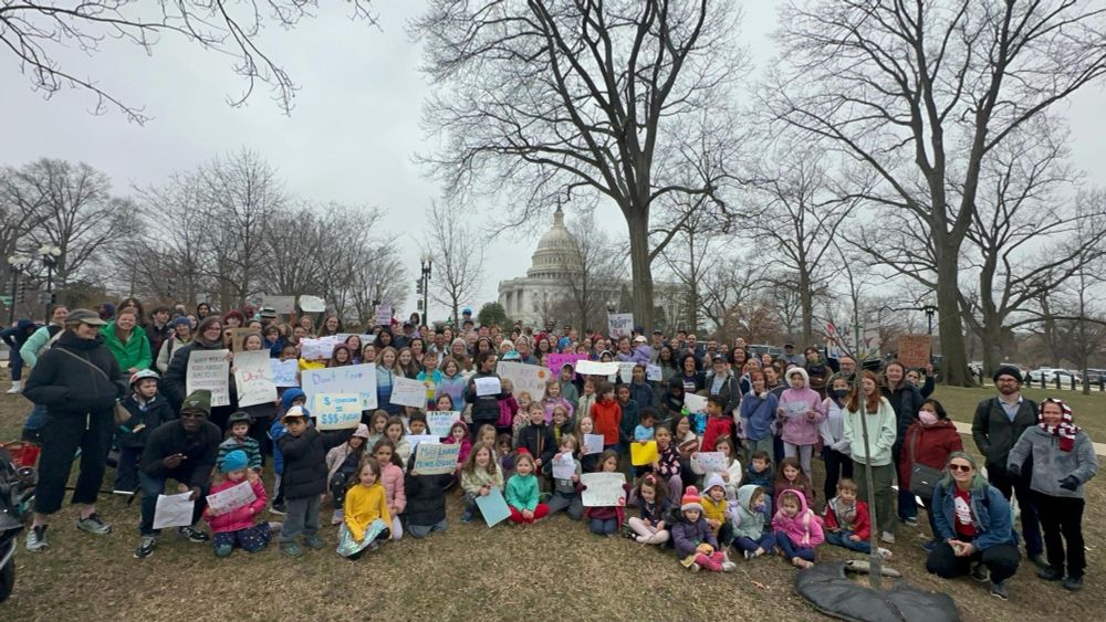 Group picture of DC residents at the US Capitol advocating for DC spending rights. 