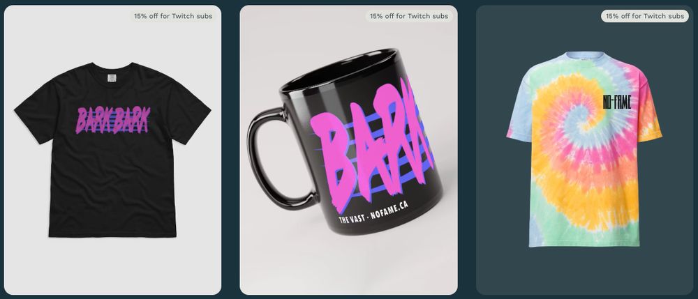 Image shows 3 merch items, two t-shirts and a mug. The first t-shirt reads 'Bark Bark' in bright pink text. The mug reads 'Bark Bark' in a similar bright pink text. The second t-shirt is a tie-dye design of bright yellow, pink, and teals that reads 'No-Fame' on the left chest area.