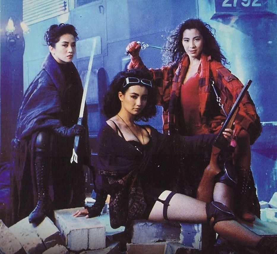 Anita Mui, Maggie Cheung, and Michelle Yeoh posing for a publicity photo for The Heroic Trio. Gosh.