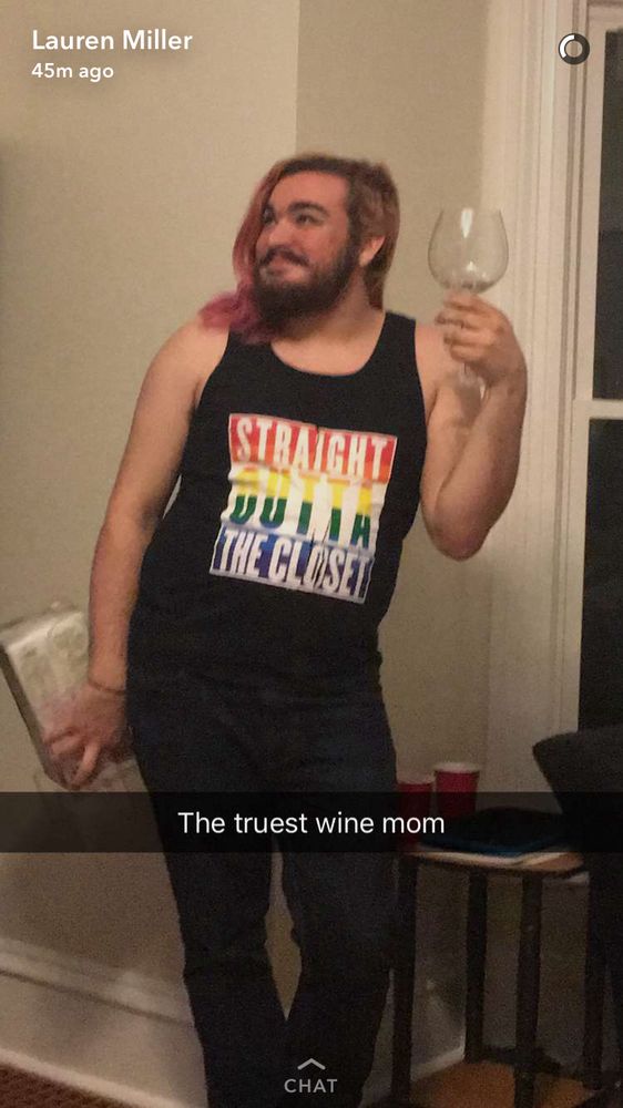 Some dude in 2017 posing with a novelty huge wine glass