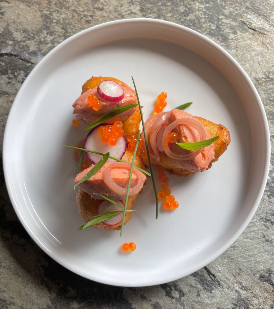 Potato puffs with smoked trout pâté.