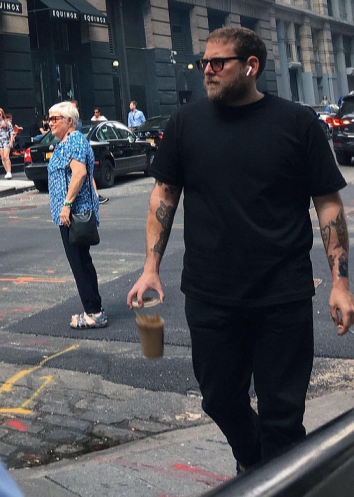 jonah hill dropping a coffe cup like a fuck 