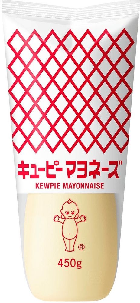 Photo of a plastic bottle of mayo. The brand is Kewpie, and the top half of the bottle has a red diamond grid pattern with a white background, and the bottom half shows the light yellow mayo.