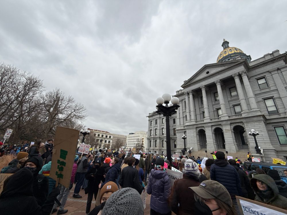 Crowd of scientists and supporters gathered in front of the Colorado State Capital