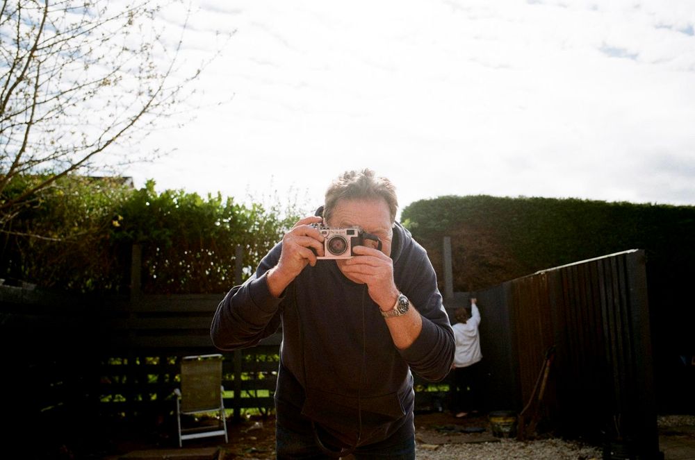 A photo of me with my Nikon S2 shot by my oldest boy Ross