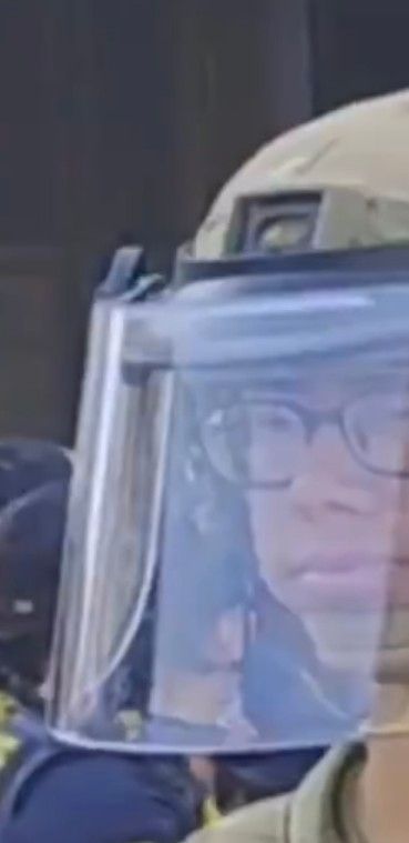 Close up of a helmeted goon