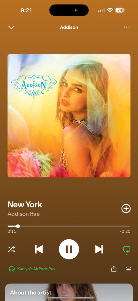 addison rae’s new album cover. her name is on funky blue text and she’s been a pastel neon tulle veil. lots of pinks and oranges 