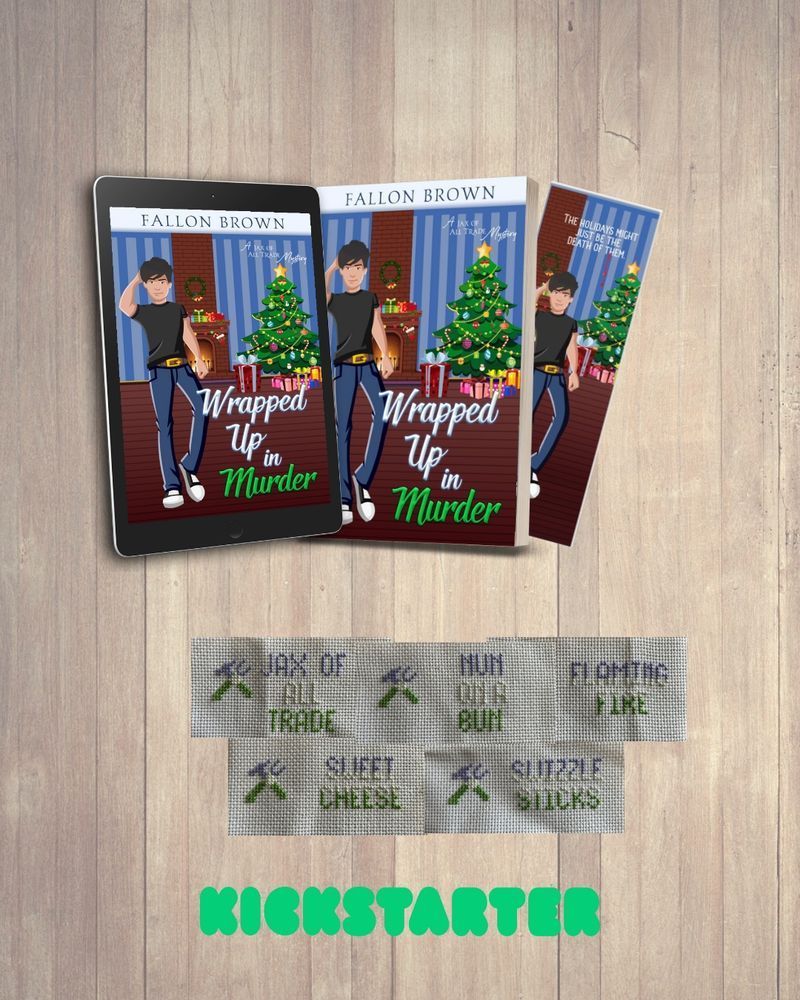 A wooden slat background, with the cover of Wrapped Up in Murder in ebook and paperback as well as a bookmark. Below those are some cross stitch bookmarks showing with the character's favorite catchphrases. As well as the kickstarter logo.