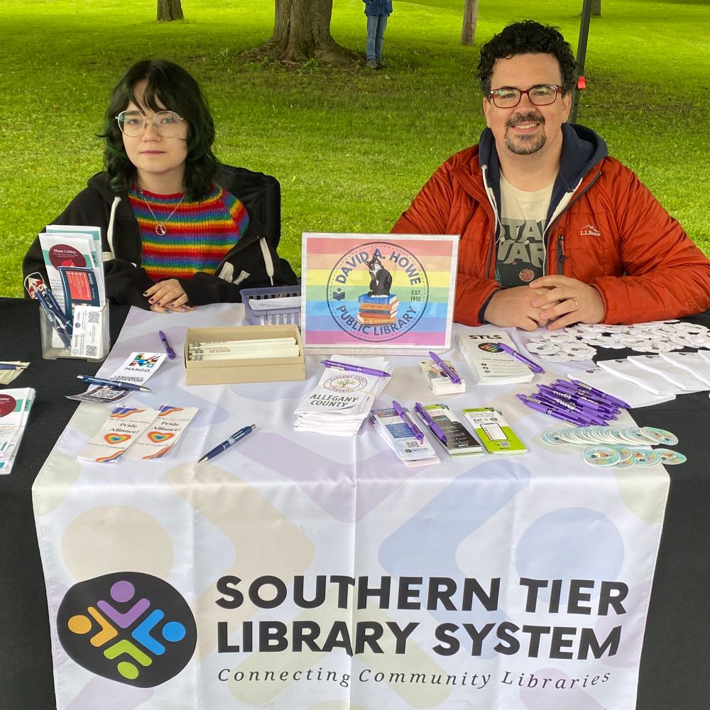 Library staff at a table