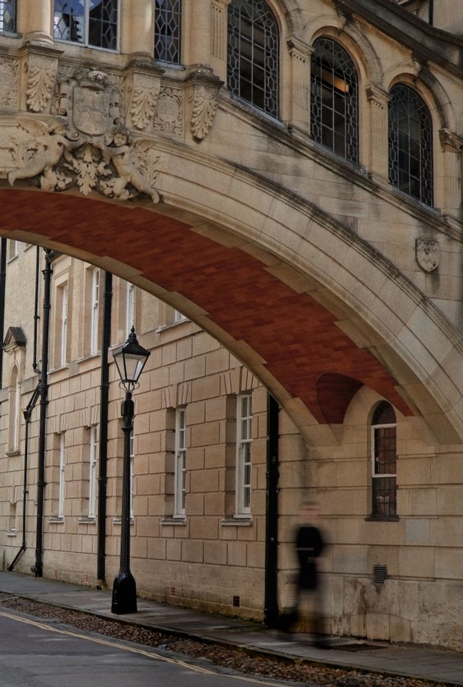 Blurry person walking under the bridge of sighs in Oxford