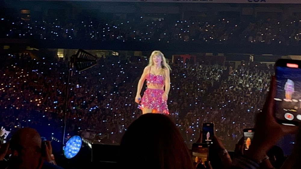 Taylor on the first night of the eras tour wearing the pink original 1989 set.