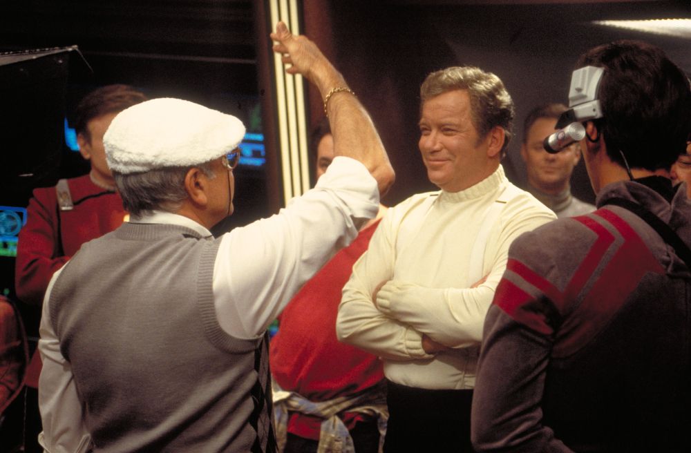 Veteran Cinematographer John Alonzo with William Shatner on the set of STAR TREK GENERATIONS. 

With films like CHINATOWN and SCARFACE in his filmography, Alonzo took first time film director David Carson under his wing, according to Producer Rick Berman: "Alonzo pretty much took David under his wing and said, 'Look, you’re the director, you can do whatever the hell you want to do.' And David took that to heart. If David had fourteen setups for a certain day and he would get seven of them done, his attitude was, 'Too bad. I’m going at the pace that I want to go.' And the studio started going ape-shit."