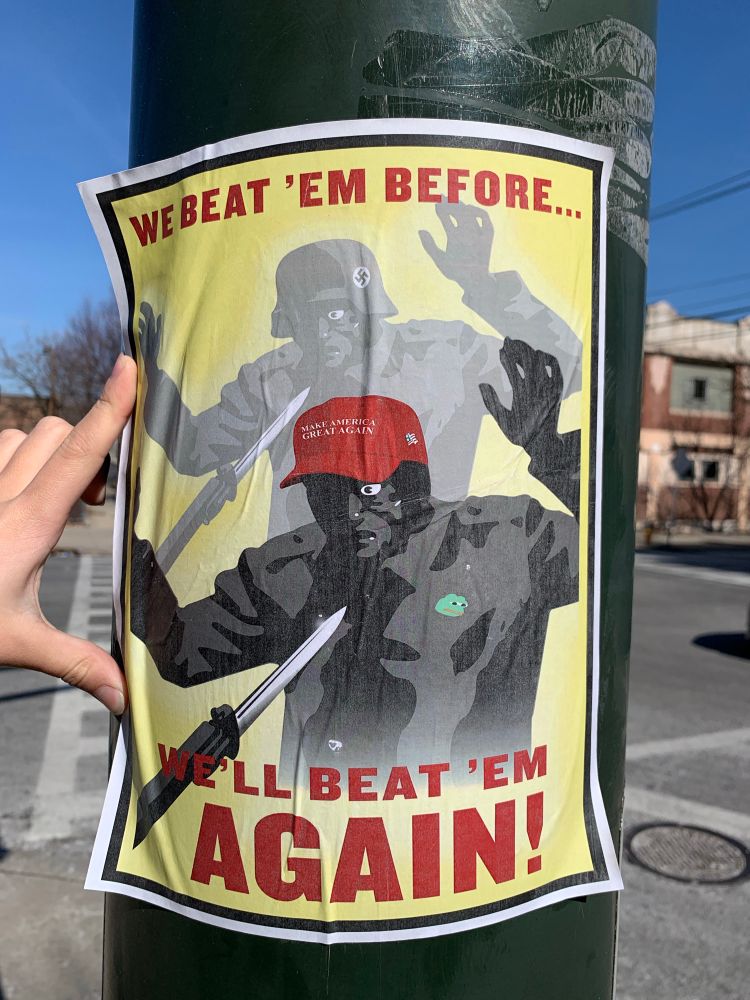 poster on a utility pole with a gray silhouette of a threatening figure, arms raised wearing a maga cap with a shadow of a similar figure wearing a nazi helmet behind them and the words

WE BEAT 'EM BEFORE …

WE’LL BEAT 'EM AGAIN!