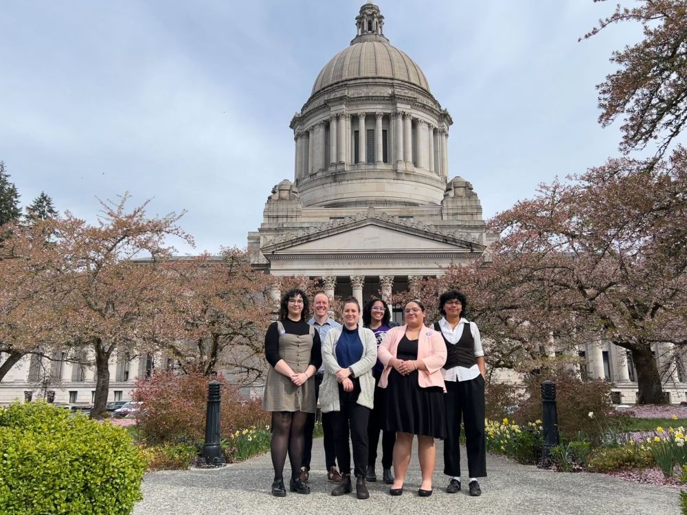 Bridges Center staff and students standing in front of the Washington State Capitol legislative building in Olympia, Washington