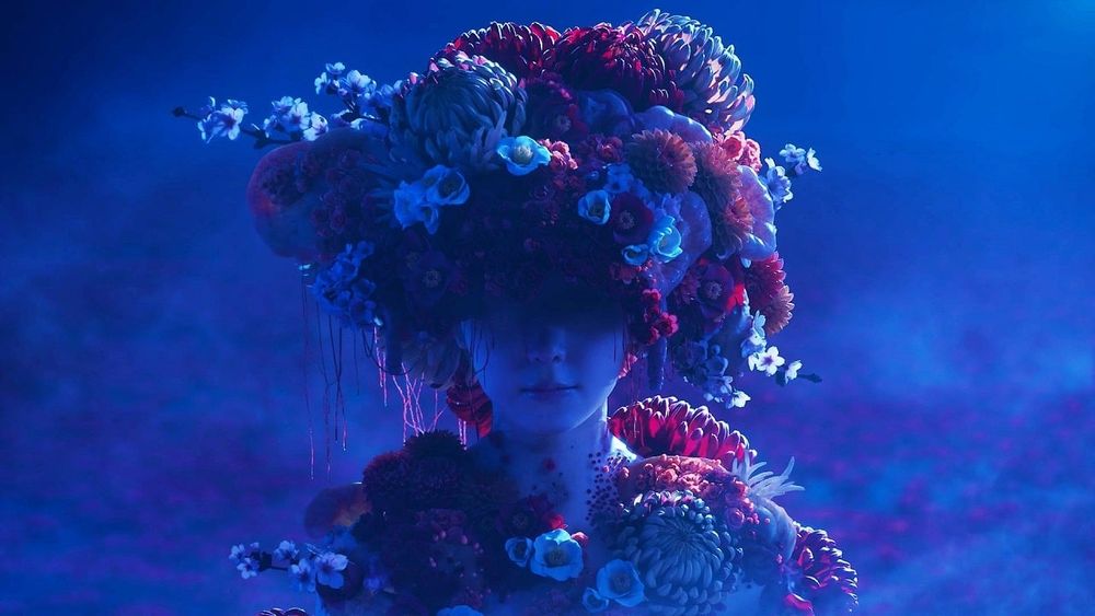 Screenshot from Silent Hill f trailer. A woman with flowers growing all over her body 