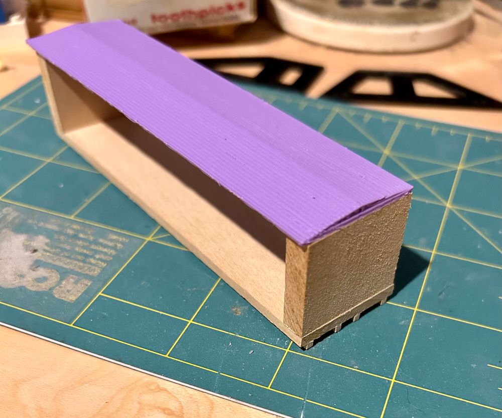 Image of the 3D printed roof part test fitted to other parts of the model. 