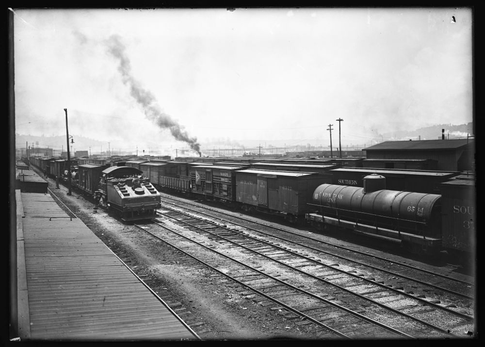Union Tank Lines tank car in freight yard. 
