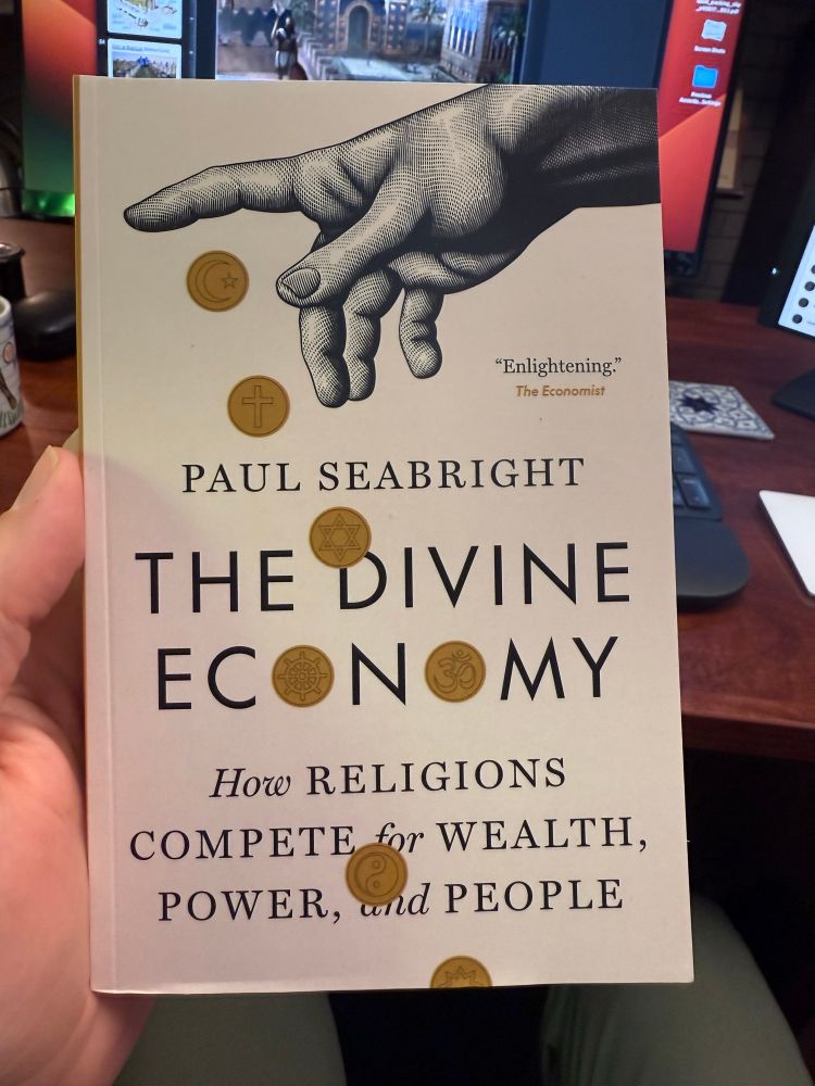 Cover of Paul Seabright’s book the divine economy: how religions compete for wealth, power, and people
