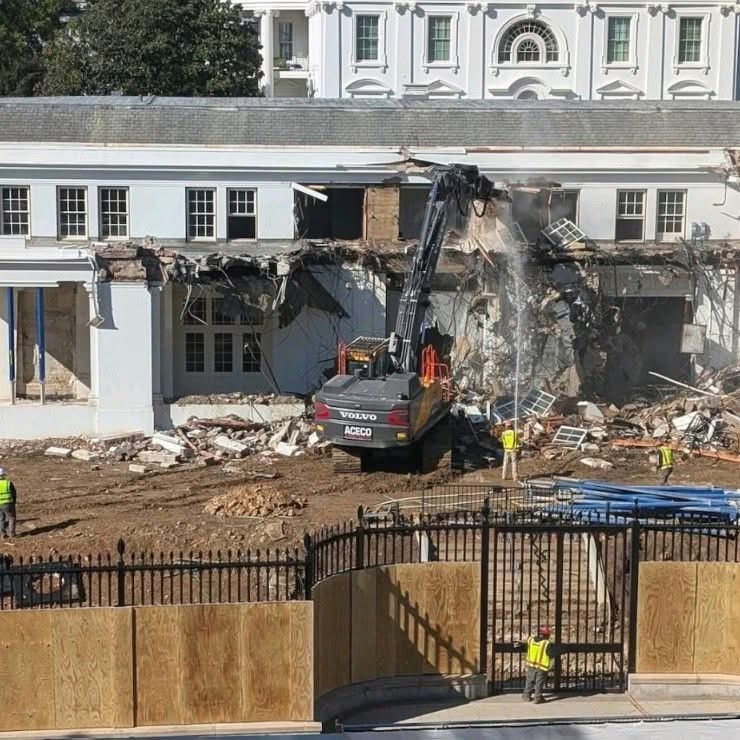 Back hoe demolishing a section of the White House