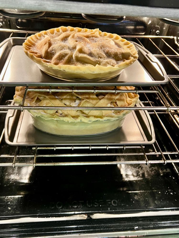 Two pies in the oven. 