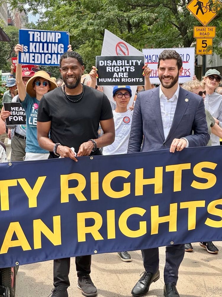 Assemblymember Alex Bores with the NYC Public Advocate at an ADA 35th anniversary protest, standing in solidarity with disability and labor advocates.