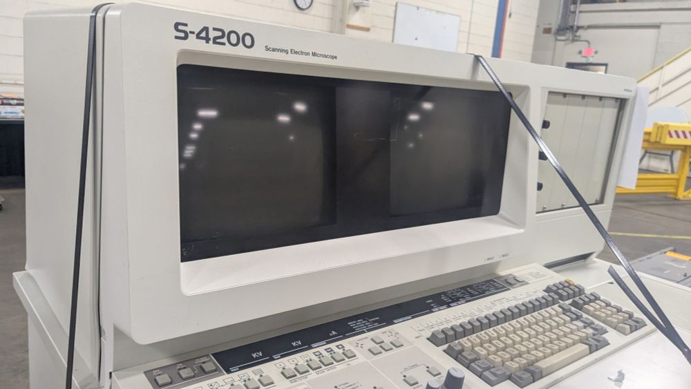 Another view of the scanning electron microscope, showing the wide display.