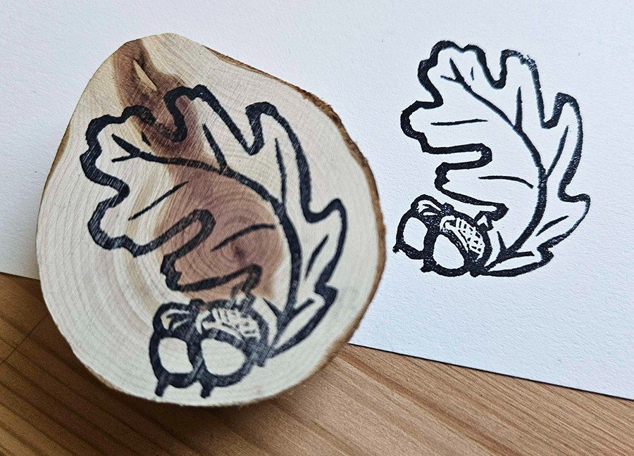 Same photo format as previous but the stamp is of an oak leaf and two acorns.