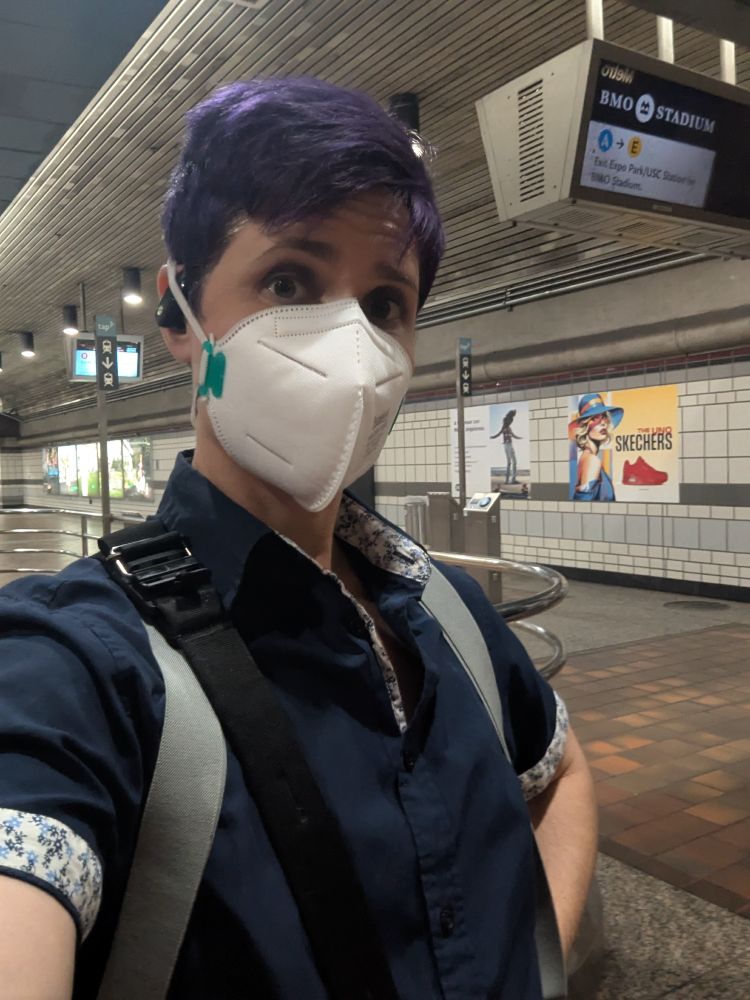 A photo of Kay, masked, to make it easier for folks to recognize them at the convention.