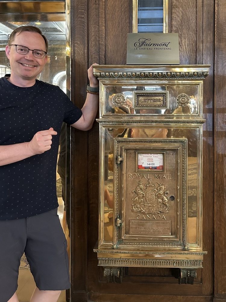 Chad in front of the Château Frontenac mail box