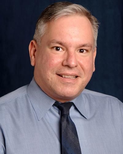 professional headshot of Dr. Ivan Balan