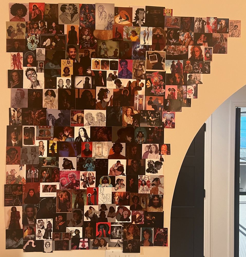 A collage of S2 Interview with the Vampire fan art posted on a beige wall. 