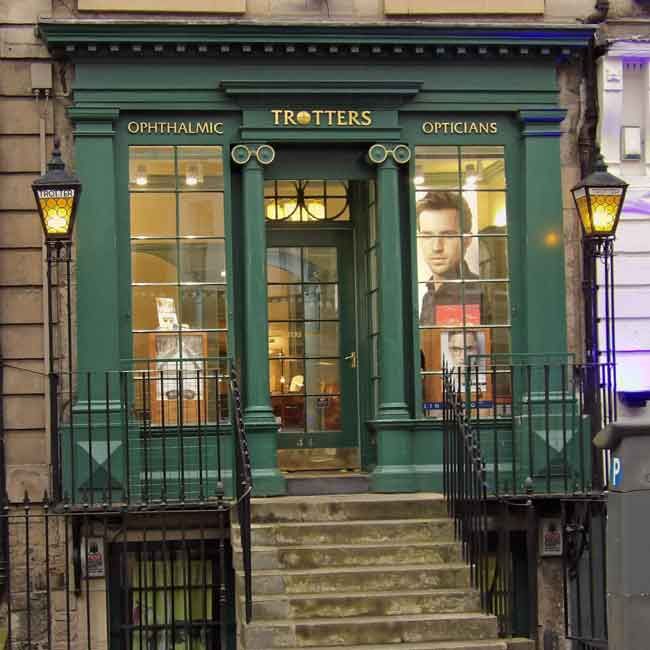 44 George street, edinburgh, a Georgian tenement (1775 approx) with a characterful post-modern shop frontage (1984-85). Operated as Trotters Opticians until 2023.