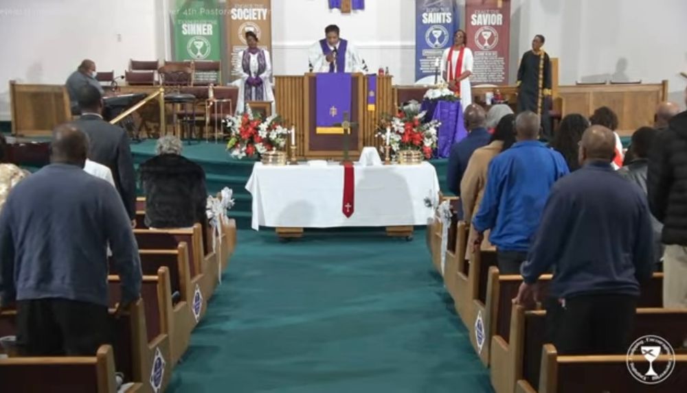 LIVE! screenshot of the church congregation from the entrance toward the alter .... all together .... all standing