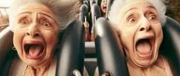 Women on rollercoaster ride screaming