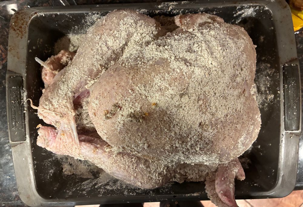 Large turkey in dry brine (buttermilk powder, kosher salt, pepper, orange zest)