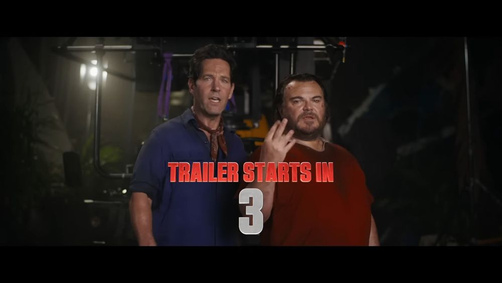 Still from the Anaconda (2025) trailer with Paul Rudd and Jack Black looking at the camera and the words "TRAILER STARTS IN 3"